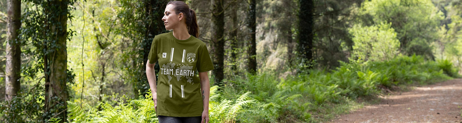 woman wearing green t-shirt with team earth text